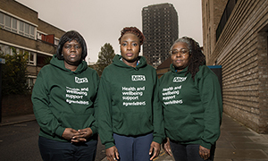 Outreach team members Mercy Banda, Sandra Ifidon Osagiede and Morine Jeffers-Murphy out on the estate