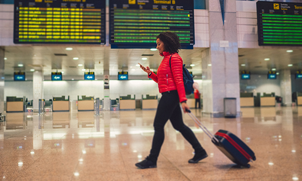 traveller walking through airport