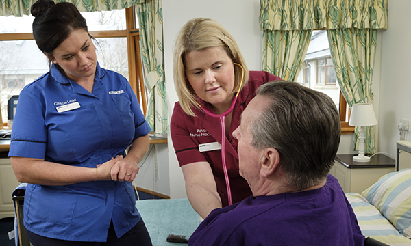 Advanced nurse with patient