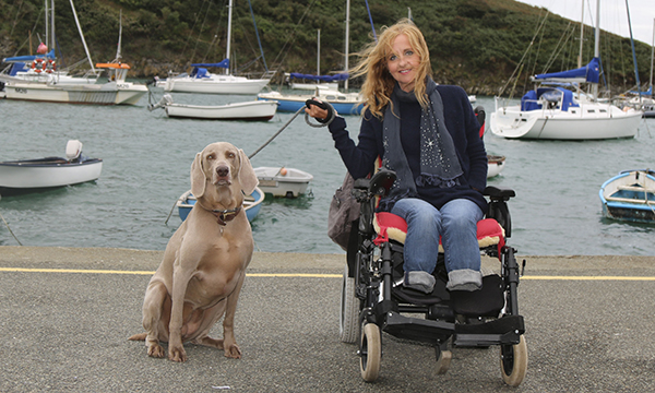Sepsis survivor and former nurse Jayne Carpenter out with her dog