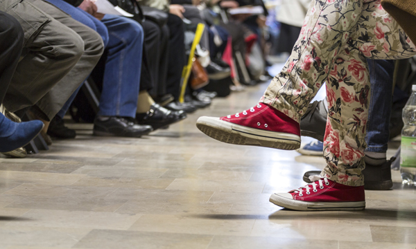 Emergency department waiting room full of people