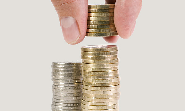 Picture shows two piles of coins