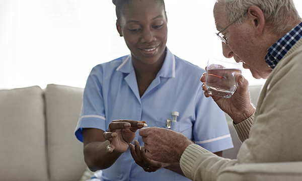 Nurse talking to patient