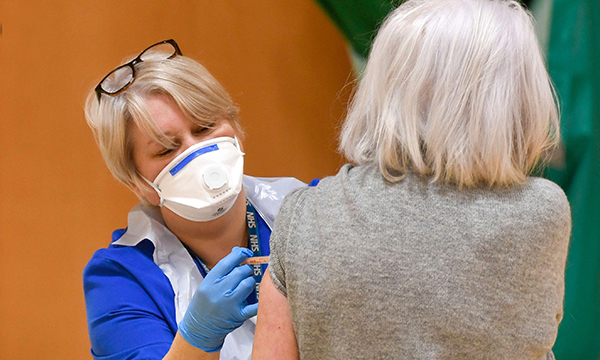 Covid vaccination being given
