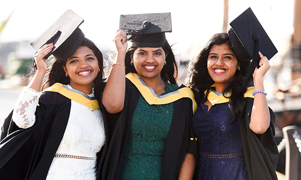 Three quadruplet sisters graduate in nursing together and now work at the same hospital