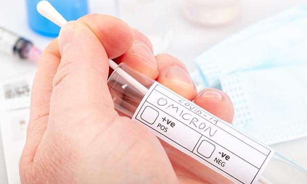 Picture shows a test kit with Omicron written on the label 