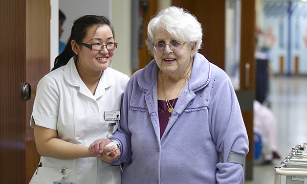 Overseas nurse with patient
