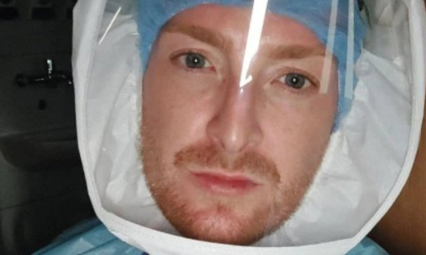 Matthew Tovey wearing personal protective equipment