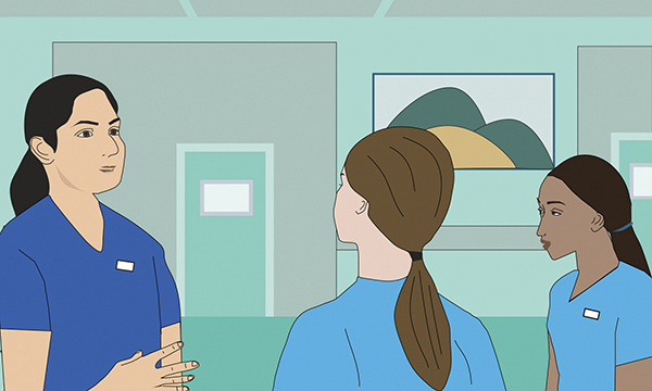 Image of a senior nurse talking to two nursing students