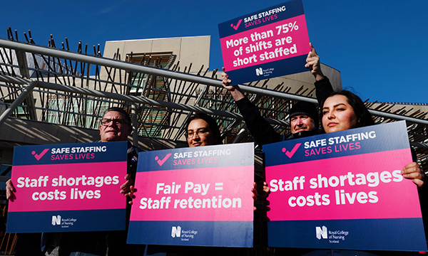 RCN Scotland members campaigning for fair pay and safe staffing outside the Scottish Parliament in October 2022