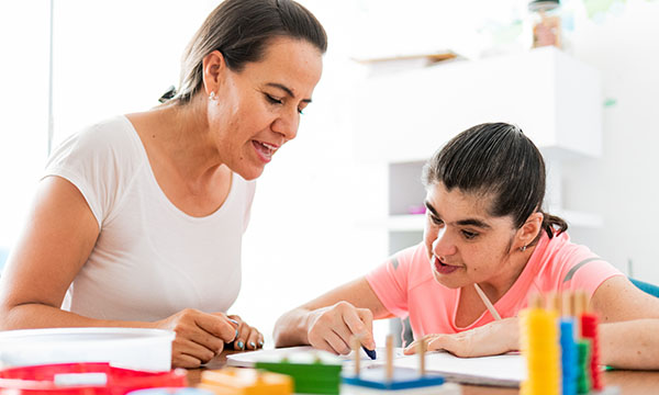  Caregivers of people with learning disabilities and their experiences of communicating with healthcare professionals