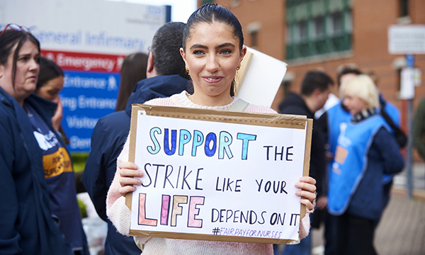 Photo of nurses striking outside Leeds General Infirmary; many staff in England in outsourced NHS services may miss out on pay rise