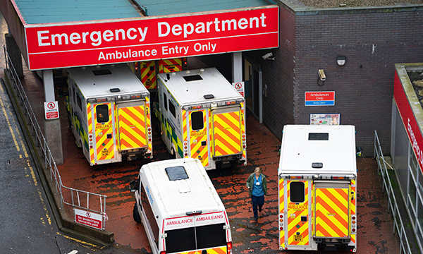Aerial view of emergency department road entrance, showing queue of ambulances