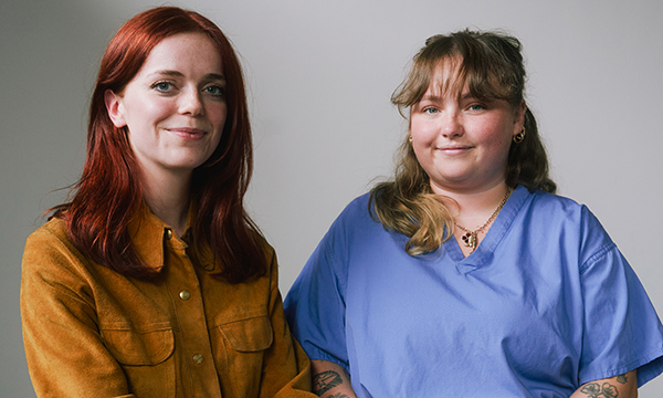 Playwright El Blackwood and her friend, nurse Izzy Howes sit side by side. They collaborated on the play Tending, which is about NHS nurses