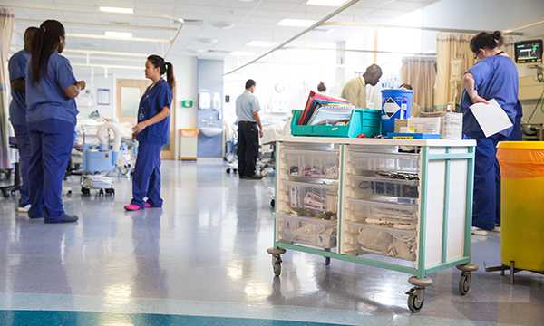 Photo of busy hospital ward, illustrating story about rising demand for care