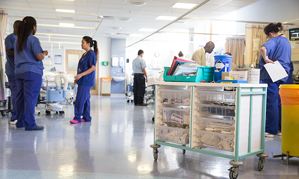 Photo of nurses on busy ward, illustrating story about nurse pay and retention