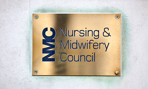 A review of nursing regulator the NMC found institutional bullying, racism and sexism. The NMC plaque is shown
