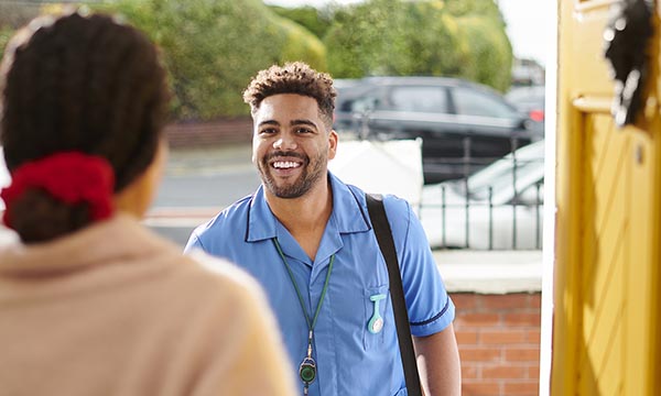 District nurse makes a home visit, working autonomously with only limited real-time support 