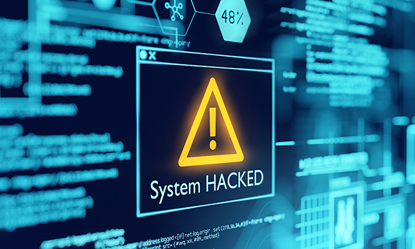 Mental healthcare and digitalisation: picture shows computer screen with System Hacked warning – recent ransomware attacks and technology outages have underlined the need for robust cybersecurity measures and disaster recovery plans