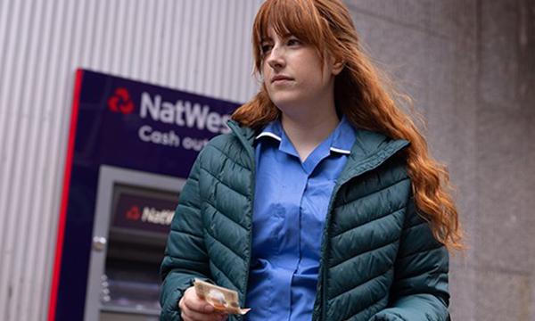 ​ Nurse salaries: a nurse holding a banknote walks away from an ATM Nurses on band 5 will see a 5.5% pay rise under the government’s offer for 2024-25 – will it be enough? Picture: Neil O’Connor [Click and drag to move] ​