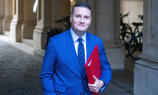 NHS managers proposals: health and social care secretary Wes Streeting holding a red file