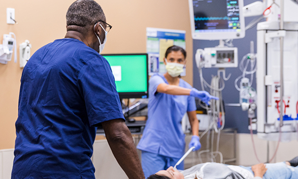 Acute response team nurse supports ward-based colleague in ICU