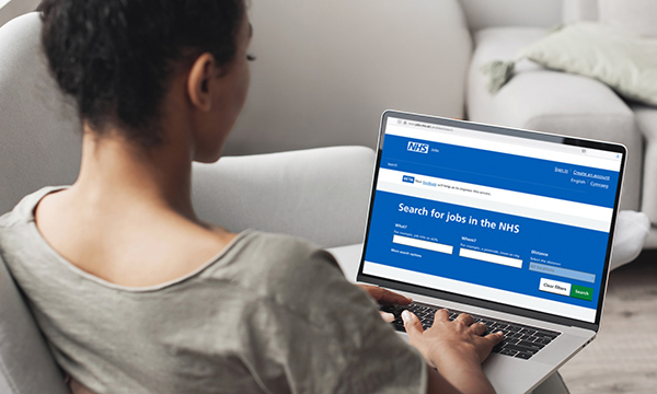 Graduate guarantee: a new scheme aims to ensure all nursing graduates will be able to find an NHS post; a young woman searches for an NHS job online