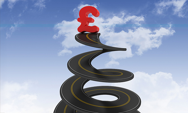 Nurses’ pay: Picture shows a bold red pound sign at the top of road that is spiralling towards the sky