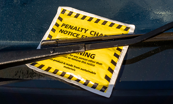 Parking permits for nurses: penalty notice stuck to car windscreen