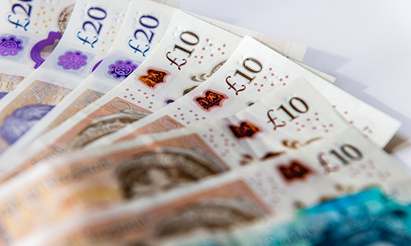 NMC registration fee rise: £10 and £20 notes fanned out