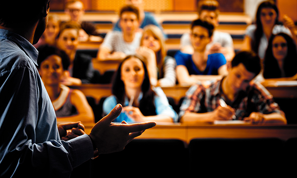 Lecture theatre with lecturer before students