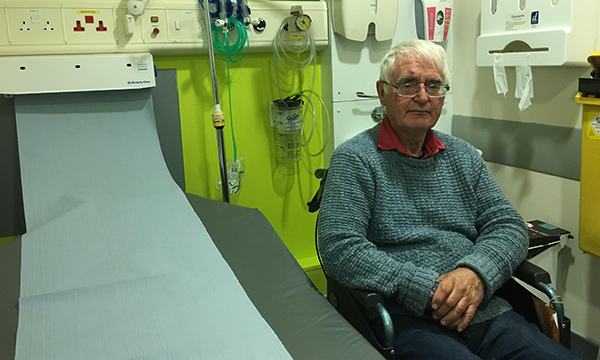 patient seated at bedside
