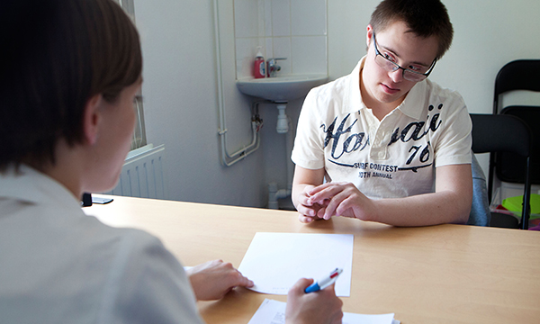 Young male patient consults nurse