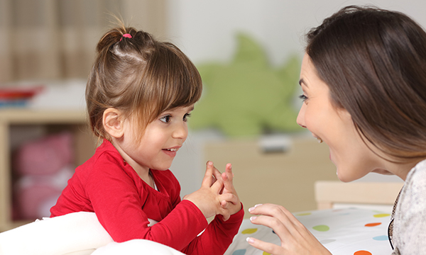 Mother and toddler playing