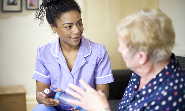 district nurse with patient
