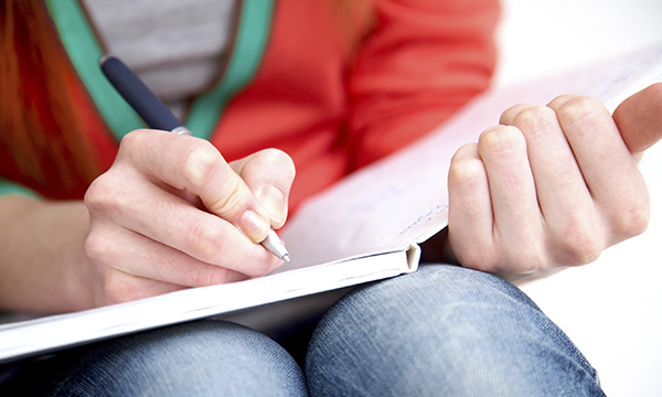 Nurse writing therapeutic poem
