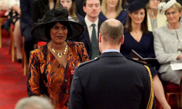 Yvonne Coghill receiving CBE