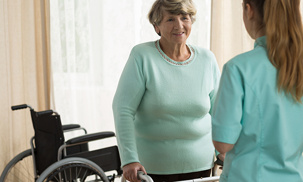 Senior with walking frame