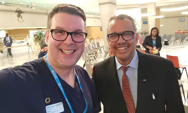 Deputy charge nurse Mark Harding with WHO director general Tedros Adhanom Ghebreyesus at the Geneva event