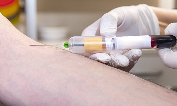 Performing venesection in a person with a learning disability