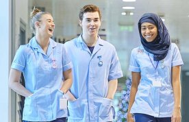 Three nursing students look happy to be on clinical placement together