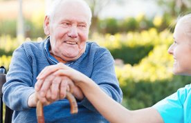 Older man with walking stick and nurse. Picture: iStock