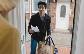 Shopping volunteer delivering supplies