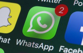 WhatsApp use by nursing students: close-up of the WhatsApp icon on a smartphone screen, alongside other social media icons