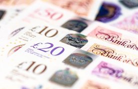 Paying nursing students on placement: close-up of several crisp £10, £20 and £50 notes