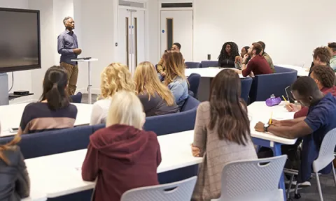 Academic clinicians: not every nurse has been an academic, but it often feels like every academic has been a nurse – picture shows students taking notes in a lecture hall