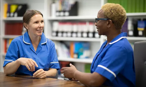 Coaching members of the healthcare team to improve care provision