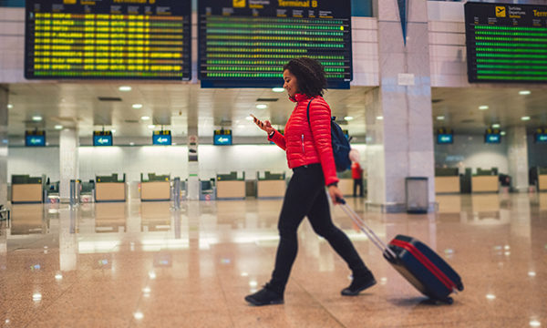 traveller walking through airport