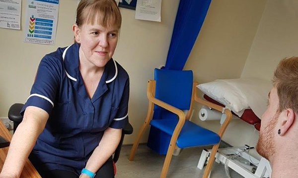 Rebecca Mounch with a patient