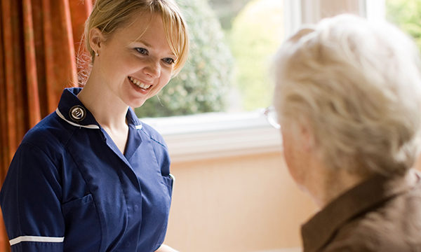district nurse visits a patient